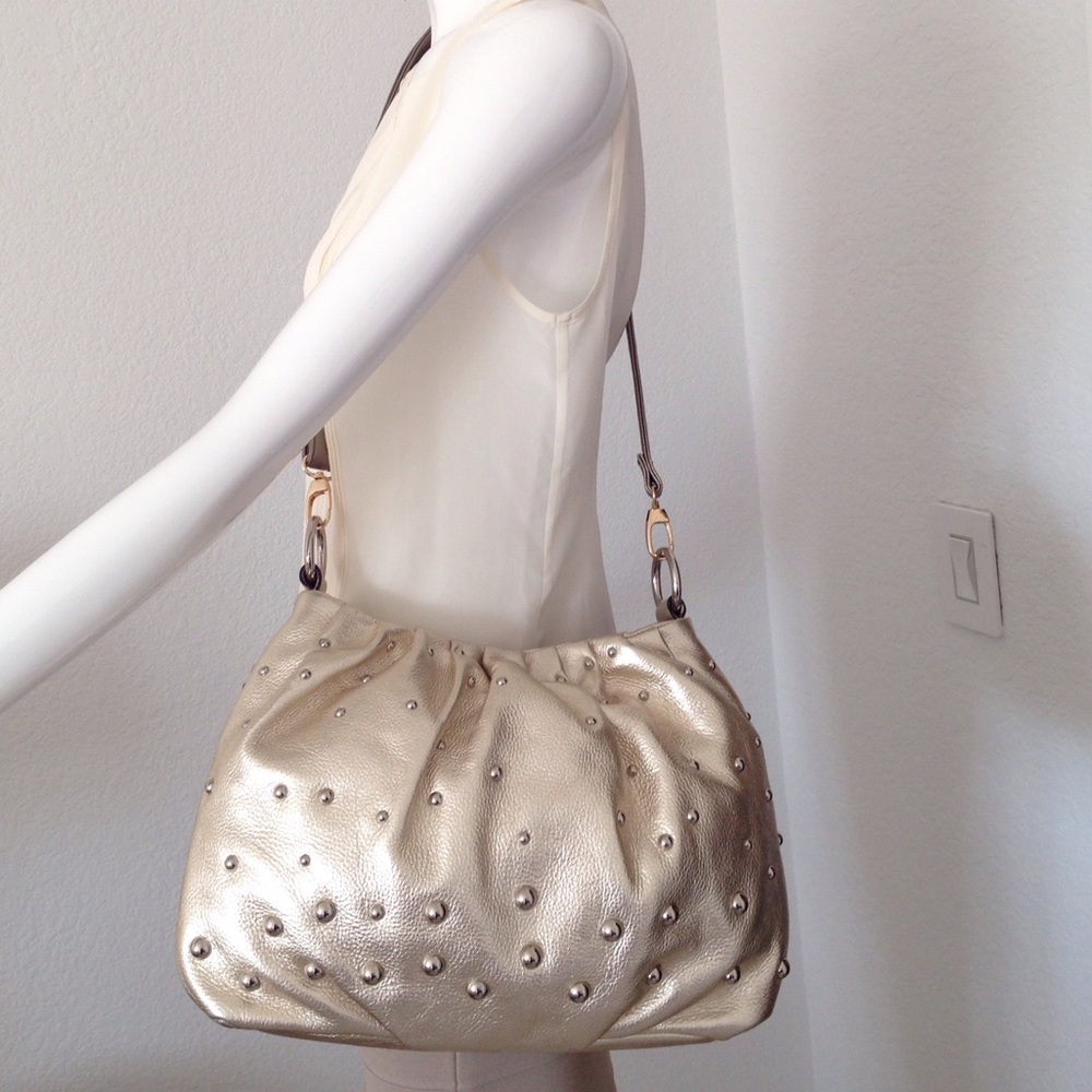 B. Makowsky gold cross body leather bag